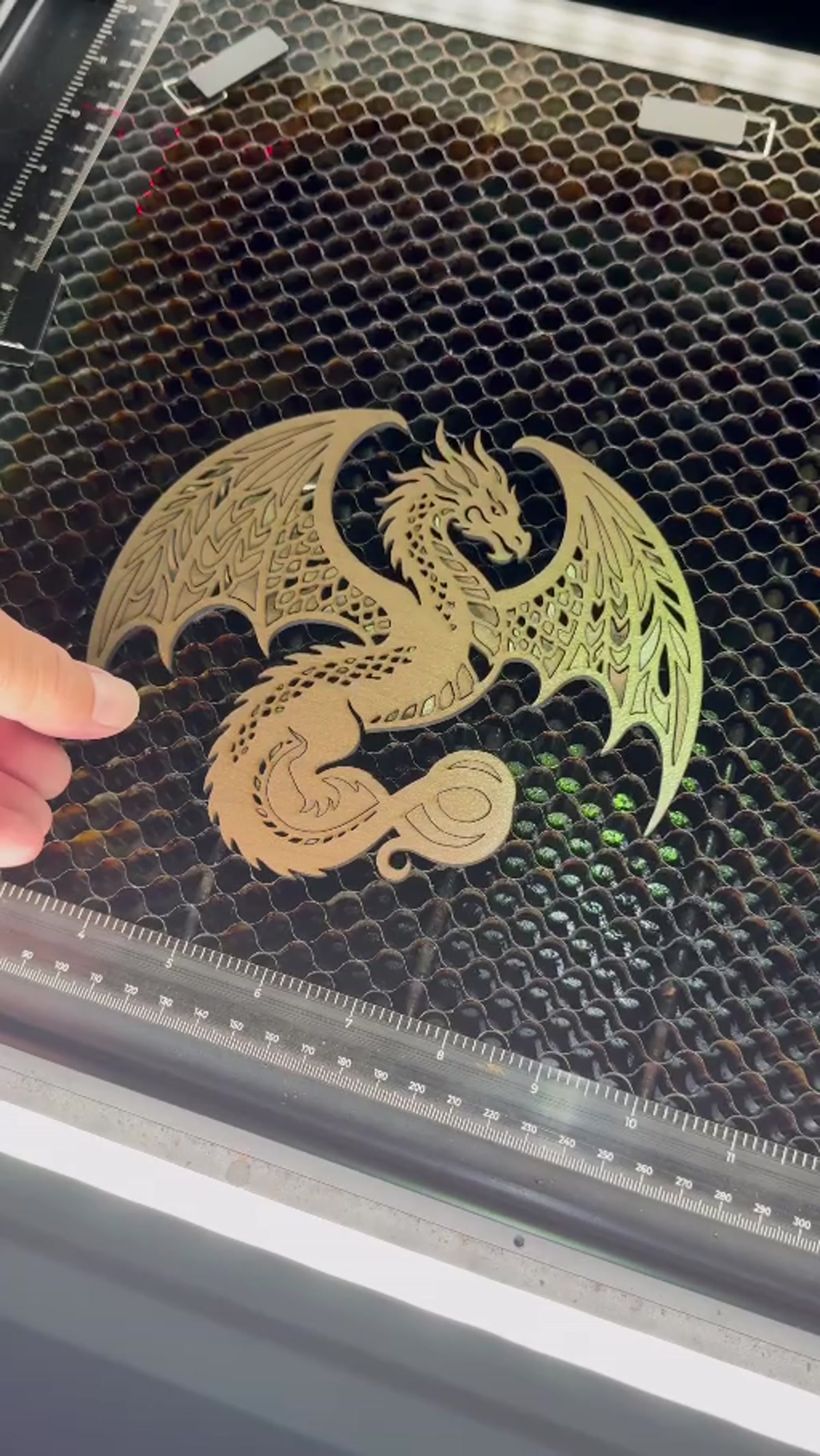 Detailed dragon freshly laser cut from wood